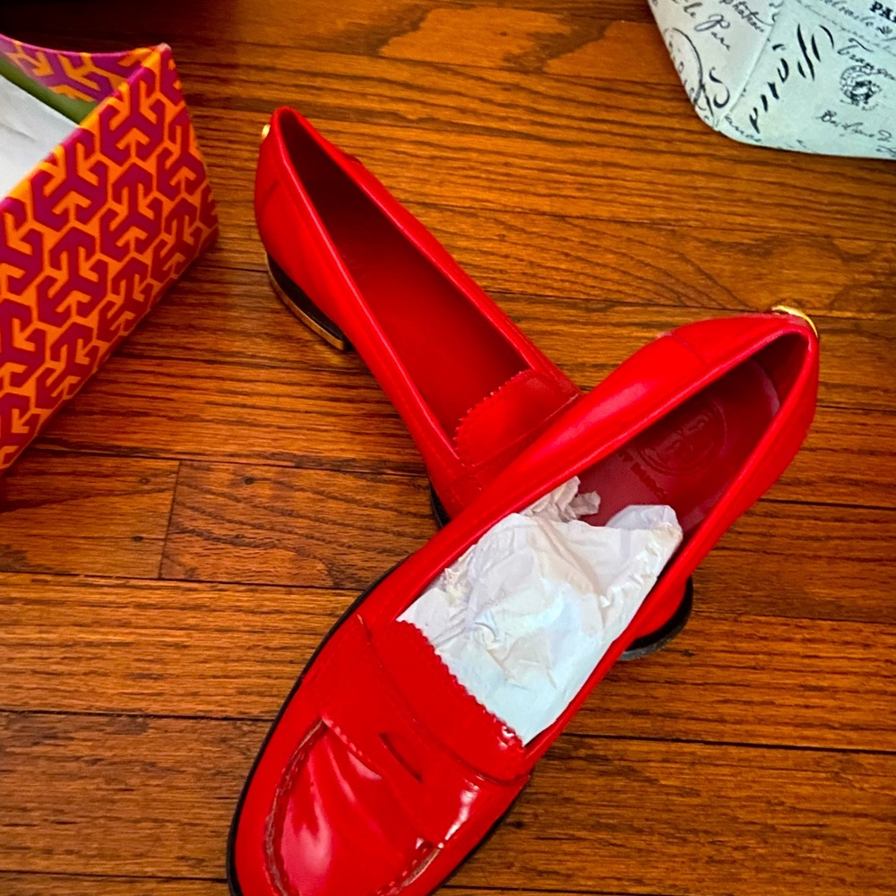 Tory Burch loafer type shoe.